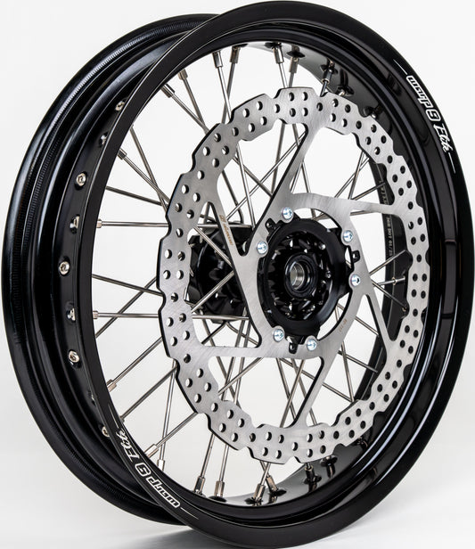 Warp 9 17-inch front supermoto wheel for Honda CRF — 320mm rotor with black hub and caliper relocation bracket