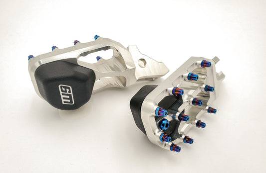 Warp 9 Elite foot peg sliders — installed detail
