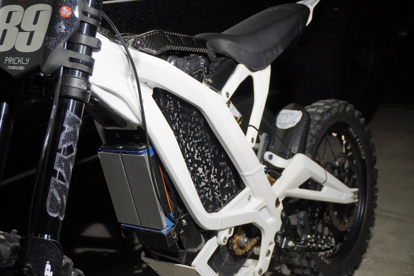 ShadowSlate black camo wrap for E-Ride Pro — air-release adhesive detail