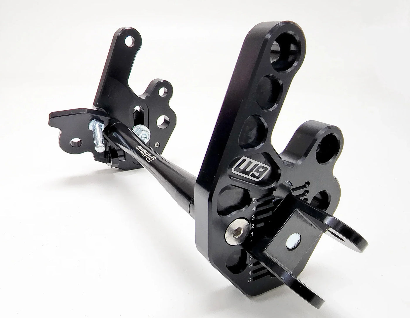 Warp 9 Adjustable Foot Peg Mount for Surron LBX & 79Bike — installed on frame