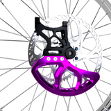 Prickly Disc Guard Fin for Surron — mounted on rear rotor