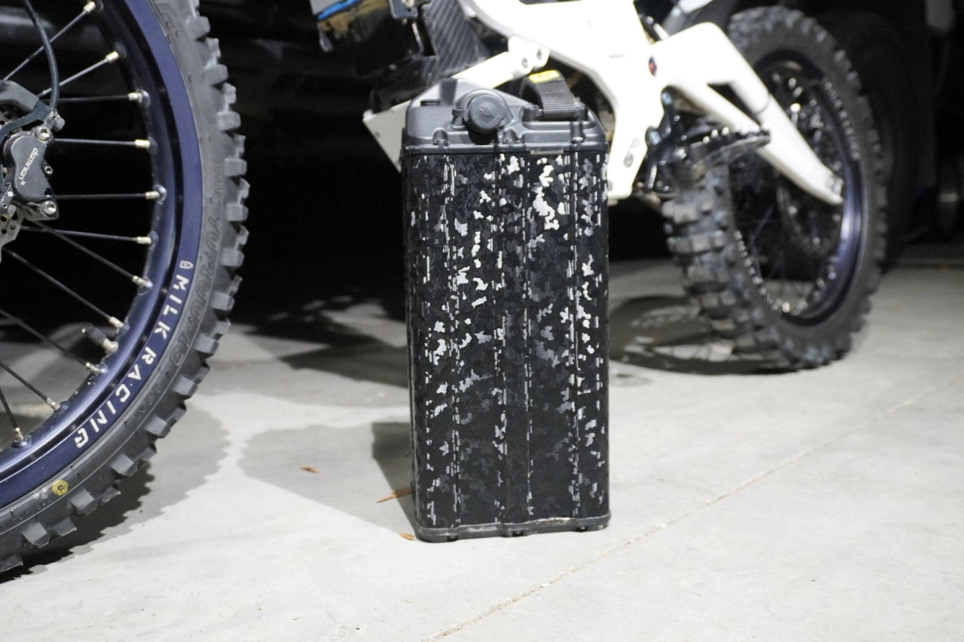 ShadowSlate black camo wrap for Surron Light Bee X — textured panel detail