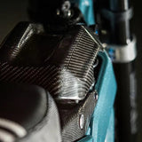 E-Ride Pro Carbon Fiber Battery Lid — installed on frame side profile