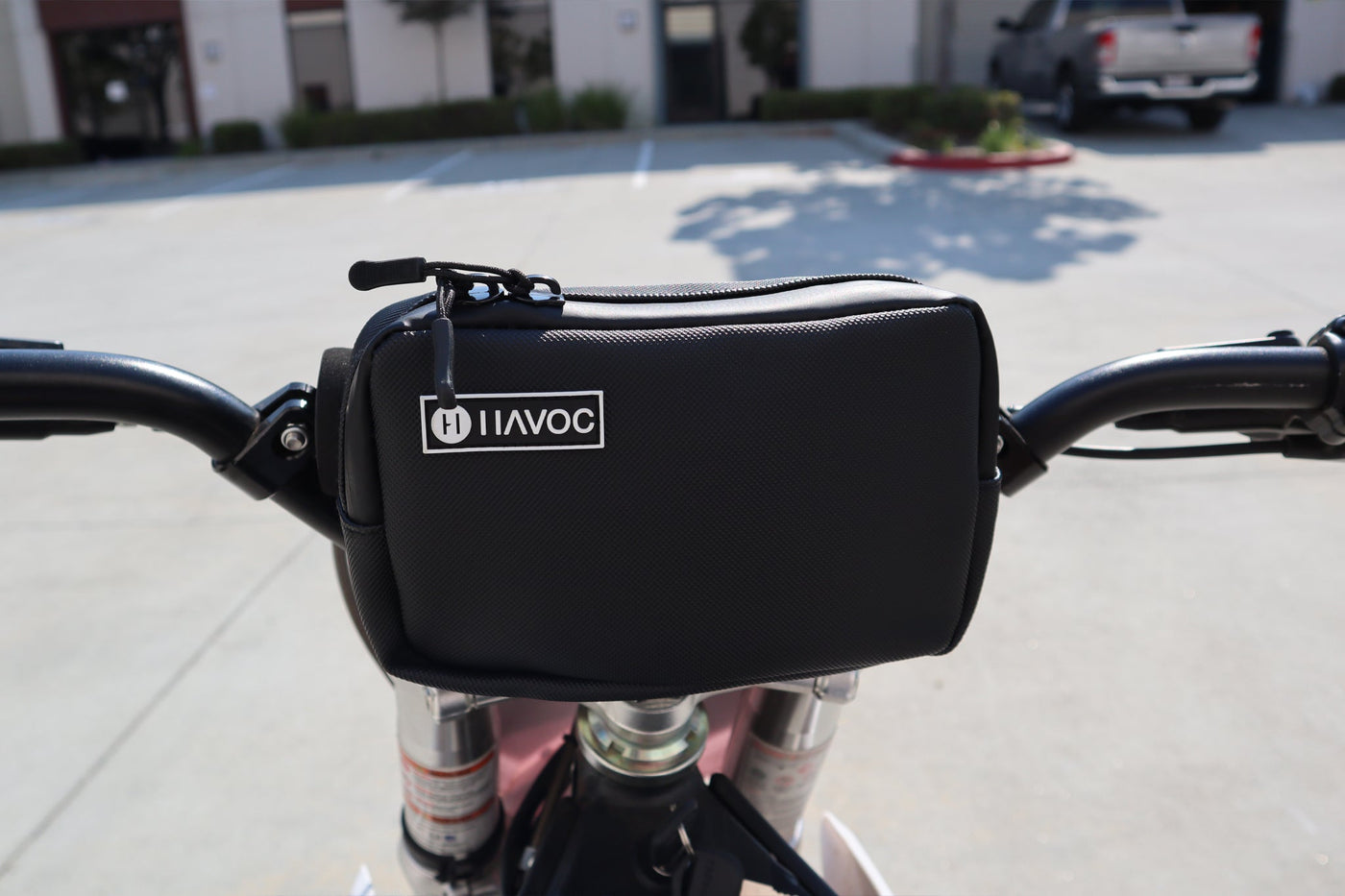 Havoc Bar Sack black colorway mounted on electric dirt bike handlebar