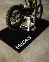 Prickly Bike Mat for e-moto builds — rubber base levels rough ground