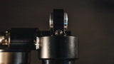 EXT REA MX rear shock for Surron Ultra Bee — mount eyelet detail