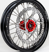Warp 9 17-inch front supermoto wheel for Honda CRF — 320mm rotor with red anodized hub and caliper relocation bracket
