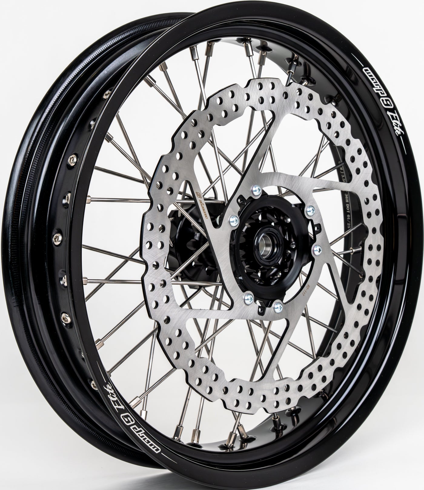 Warp 9 17-inch front supermoto wheel for Honda CRF — 320mm rotor with black hub and caliper relocation bracket
