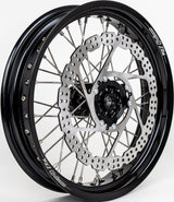 Warp 9 17-inch front supermoto wheel for Honda CRF — 320mm rotor with black hub and caliper relocation bracket
