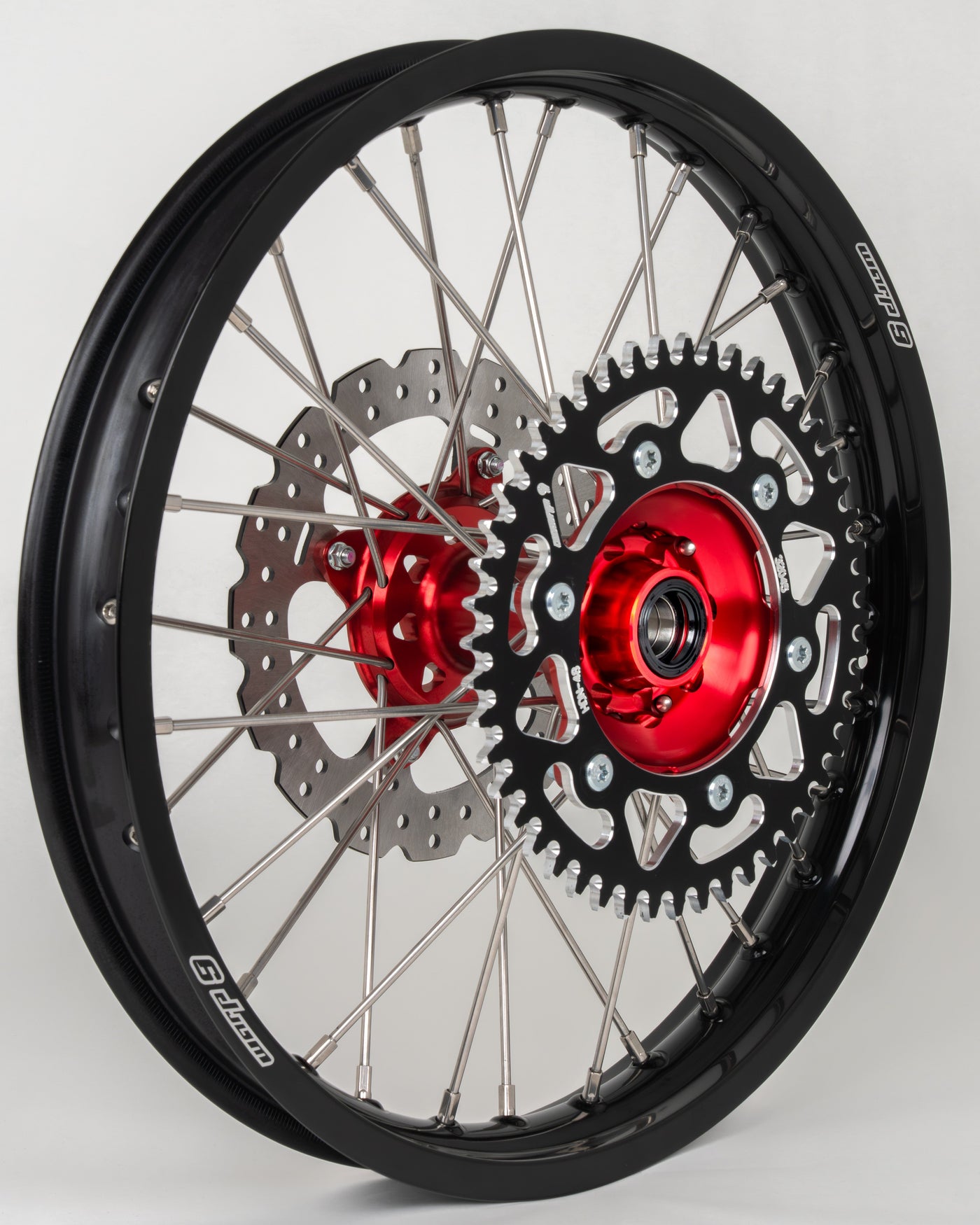 Warp 9 supermoto rear wheel for early Honda CR/CRF — 240mm rotor with red anodized hub and choice of sprocket
