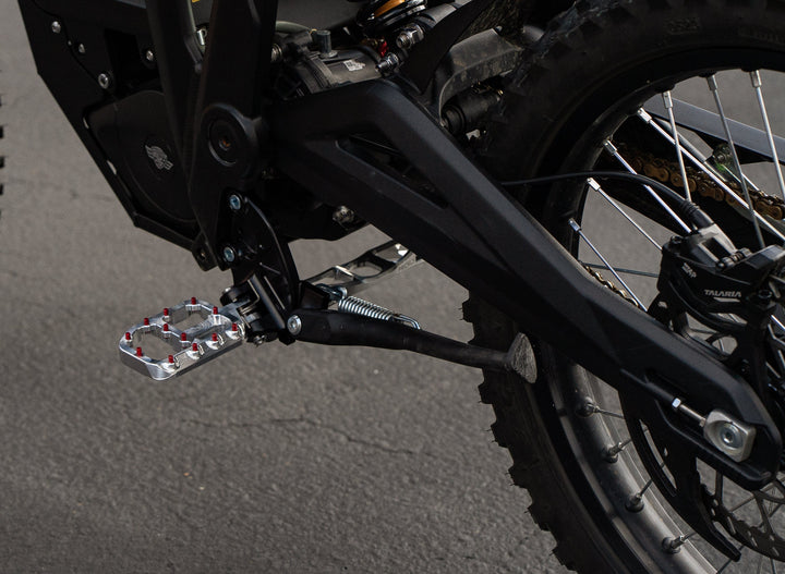 Footpeg Brackets for Talaria Sting — billet brackets installed detail