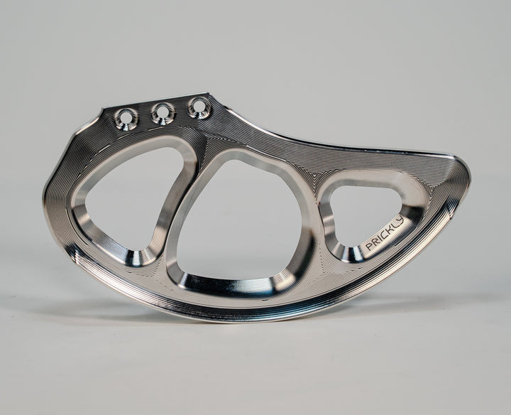 Prickly Disc Guard Fin for Surron — billet 7075 rear rotor guard