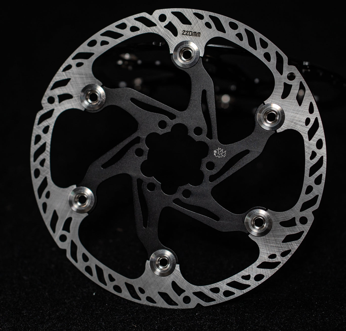 Prickly 220mm floating rotor for Surron — billet carrier detail