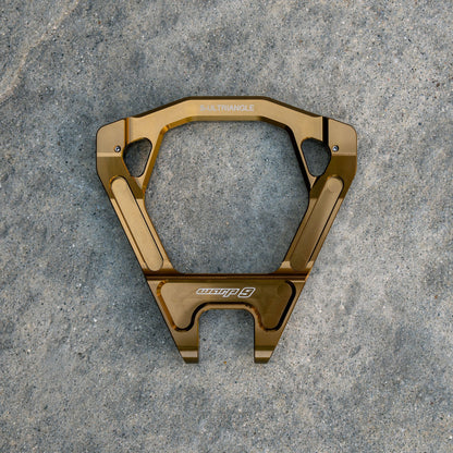 Warp 9 forged suspension linkage triangle for Surron Ultra Bee — grease zerk fitting detail
