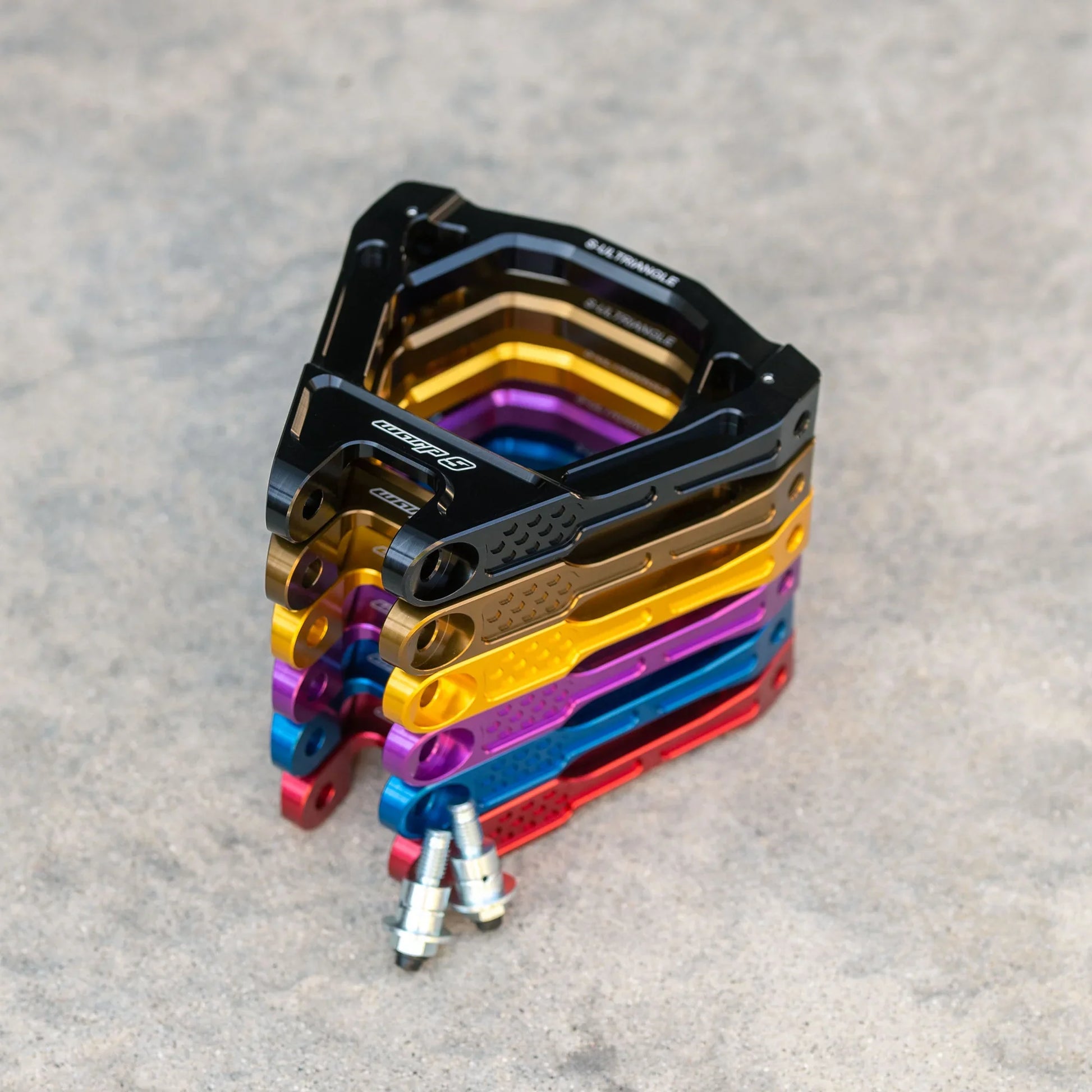 Warp 9 forged suspension linkage triangle for Surron Ultra Bee — side profile detail