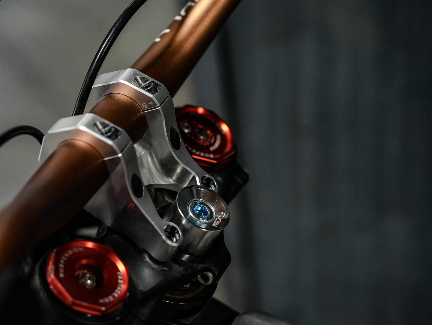 Prickly Stem Lock for Surron LBX — direct mount stem headset lock install detail