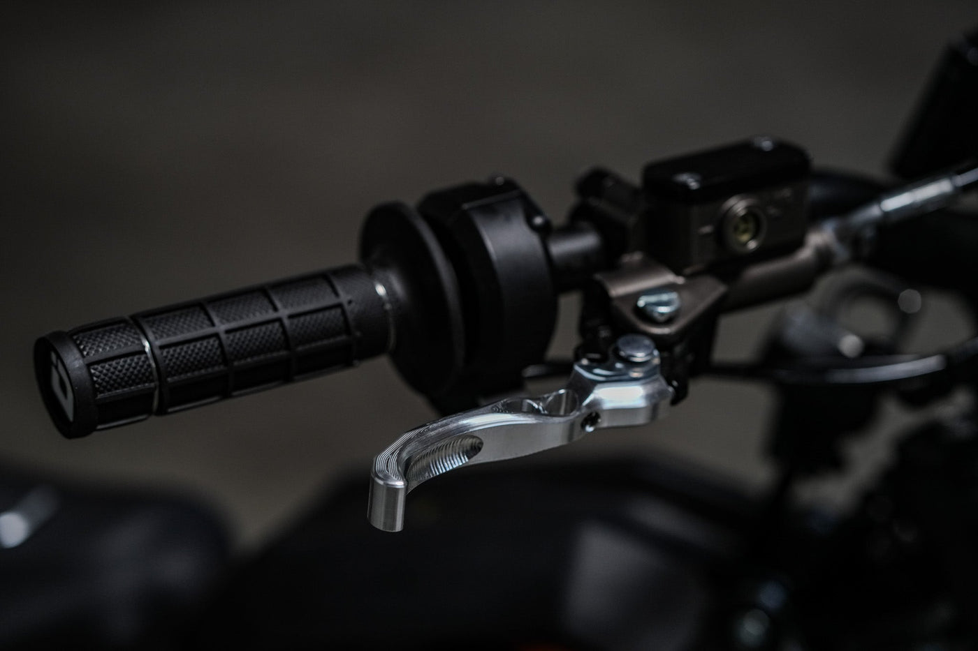 Prickly Shorty Moto brake lever for Surron Ultra Bee — installed on handlebar