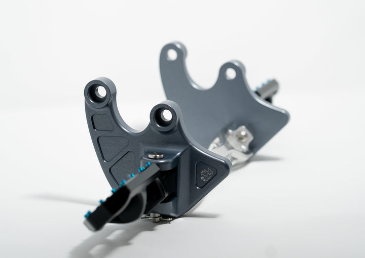 Footpeg Brackets for E-Ride Pro — billet brackets installed on bike