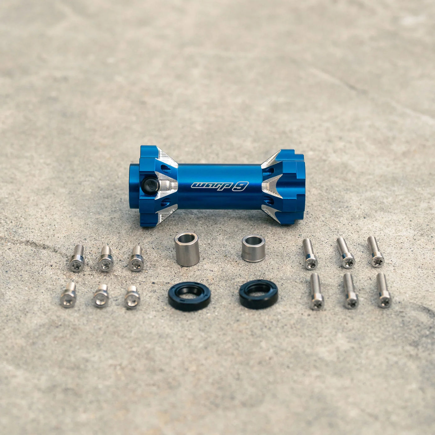 Warp 9 Jackshaft for Surron LBX — dual grease port detail close-up