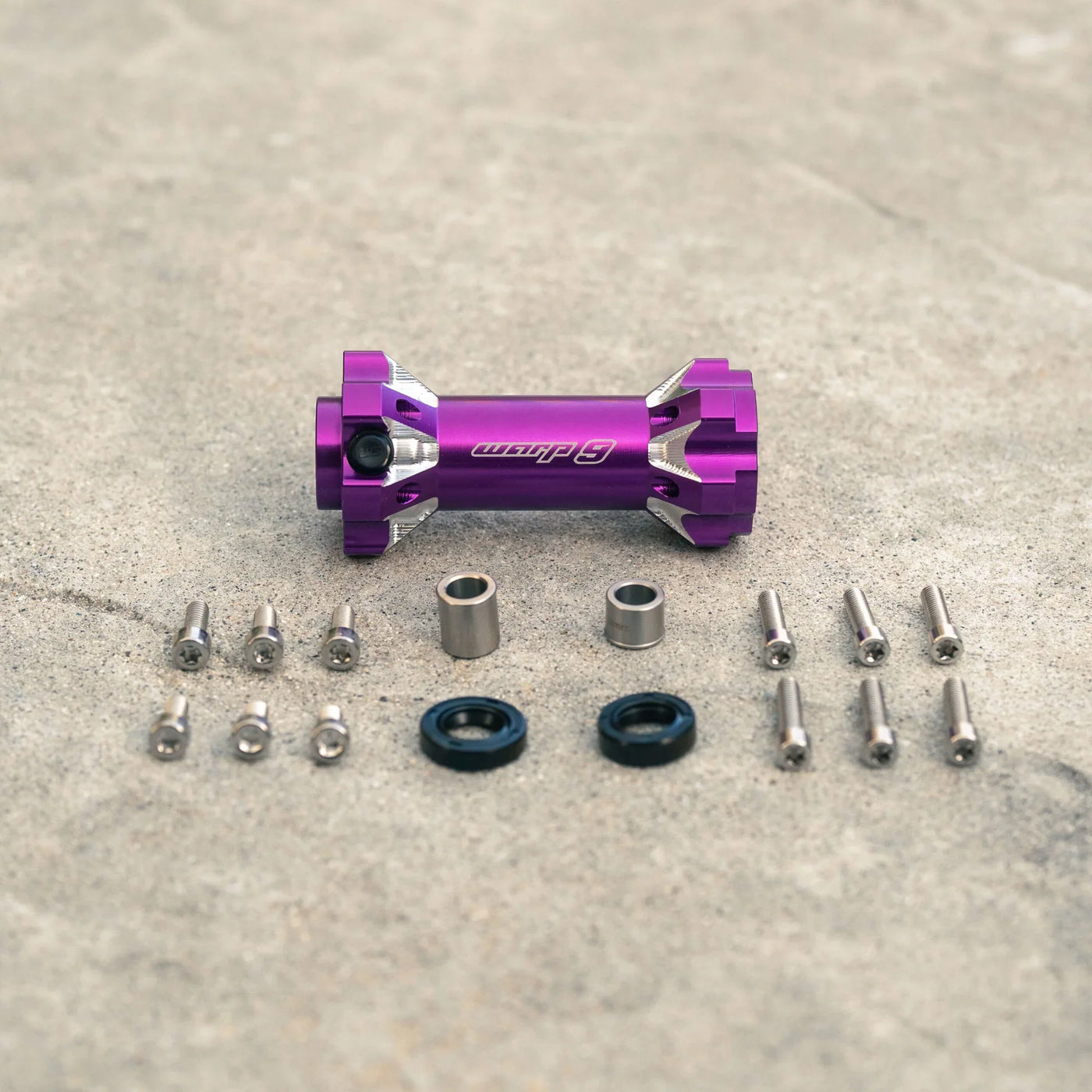 Warp 9 Jackshaft for Surron LBX — side profile showing housing length