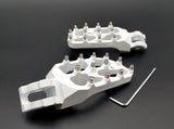 Warp 9 E-Moto Elite Foot Pegs — installed on Surron LBX side view