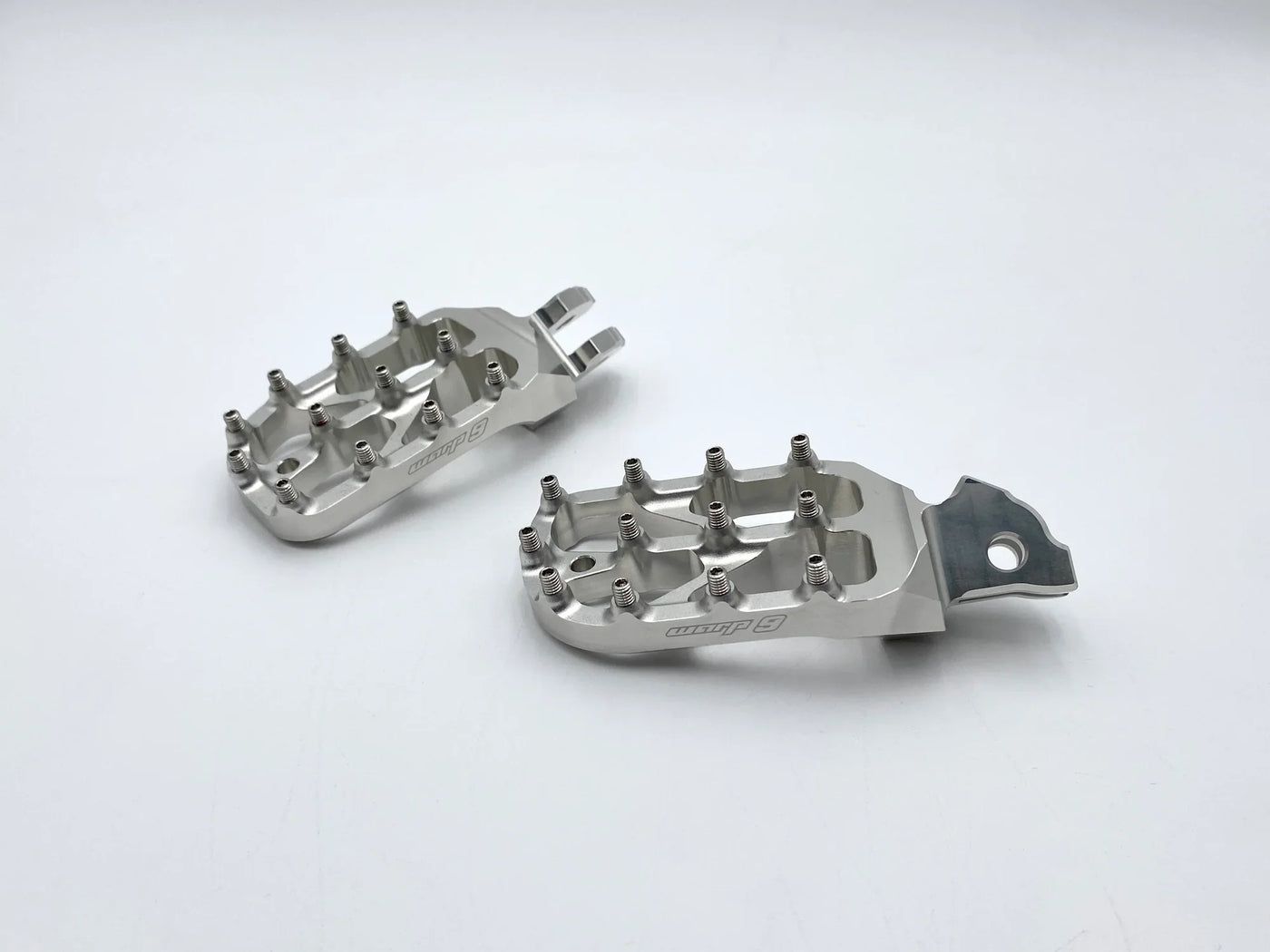 Warp 9 E-Moto Elite Foot Pegs — traction teeth and platform surface detail