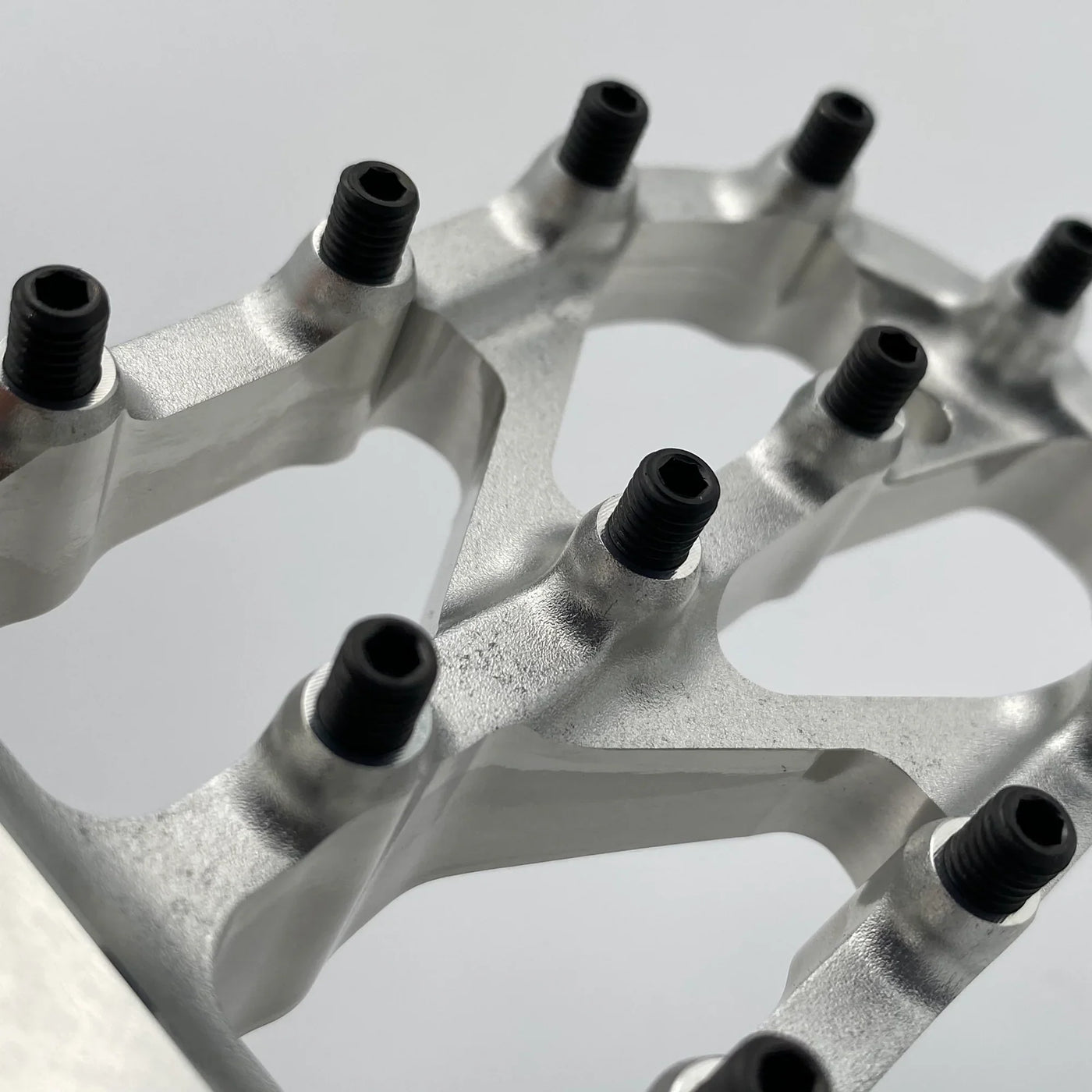 Warp 9 Titanium Elite Foot Peg Screws for Surron — M5 set screw variant front view