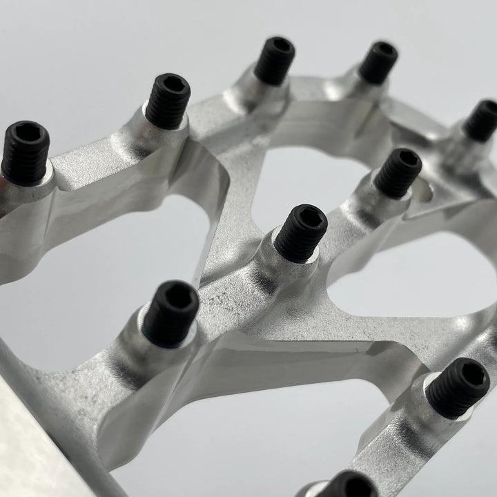 Warp 9 Titanium Elite Foot Peg Screws for Surron — M5 set screw variant front view