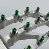 Warp 9 Titanium Elite Peg Screws for Surron — angled view showing screw head geometry