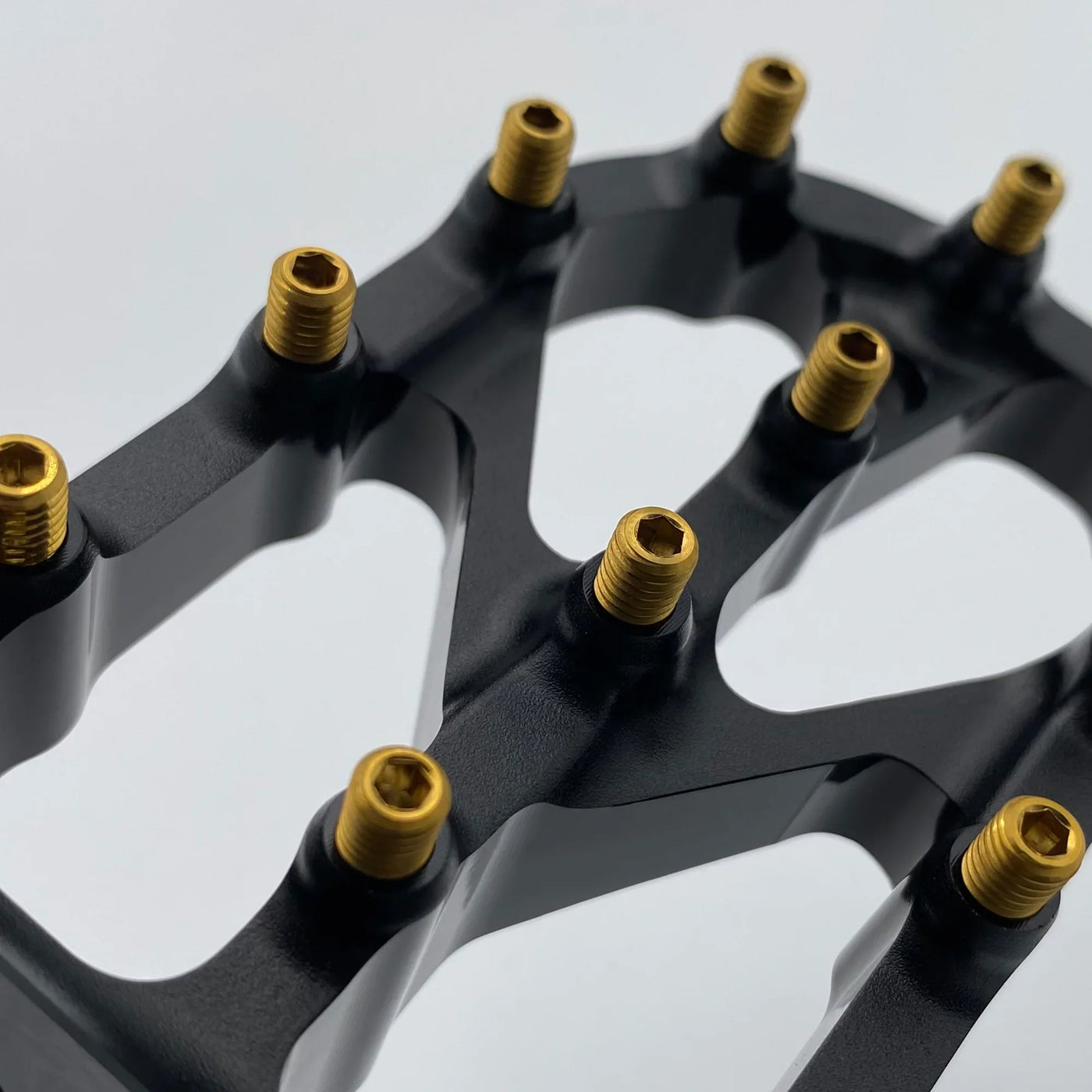 Warp 9 Titanium Peg Screws for Surron — close-up of screw tip engagement surface