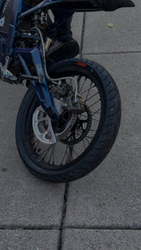 Surron LBX CST Supermoto Wheel Set — stainless spokes detail | ThrottleCo