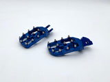 Warp 9 Elite Foot Pegs side profile — uses OEM springs and pivot pins, no modification needed
