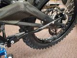 Warp 9 kickstand installed on Talaria e-moto — magnet in pivot head retains kickstand lockout feature