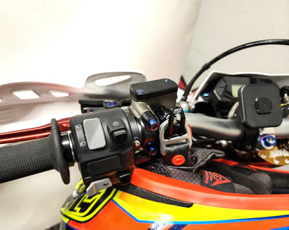 Warp 9 Helmet Hook for Surron Light Bee X — installed on handlebar
