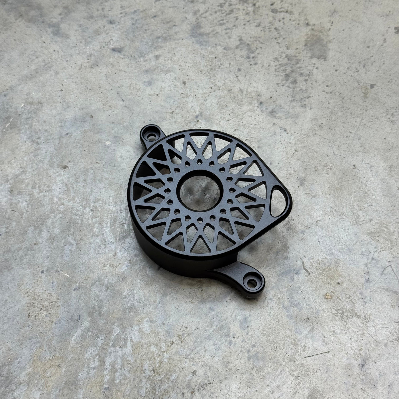 Surron LBX Aluminum Motor Cover — black anodized finish, lattice pattern