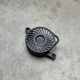 Surron LBX Aluminum Motor Cover — black anodized finish, radial fin pattern