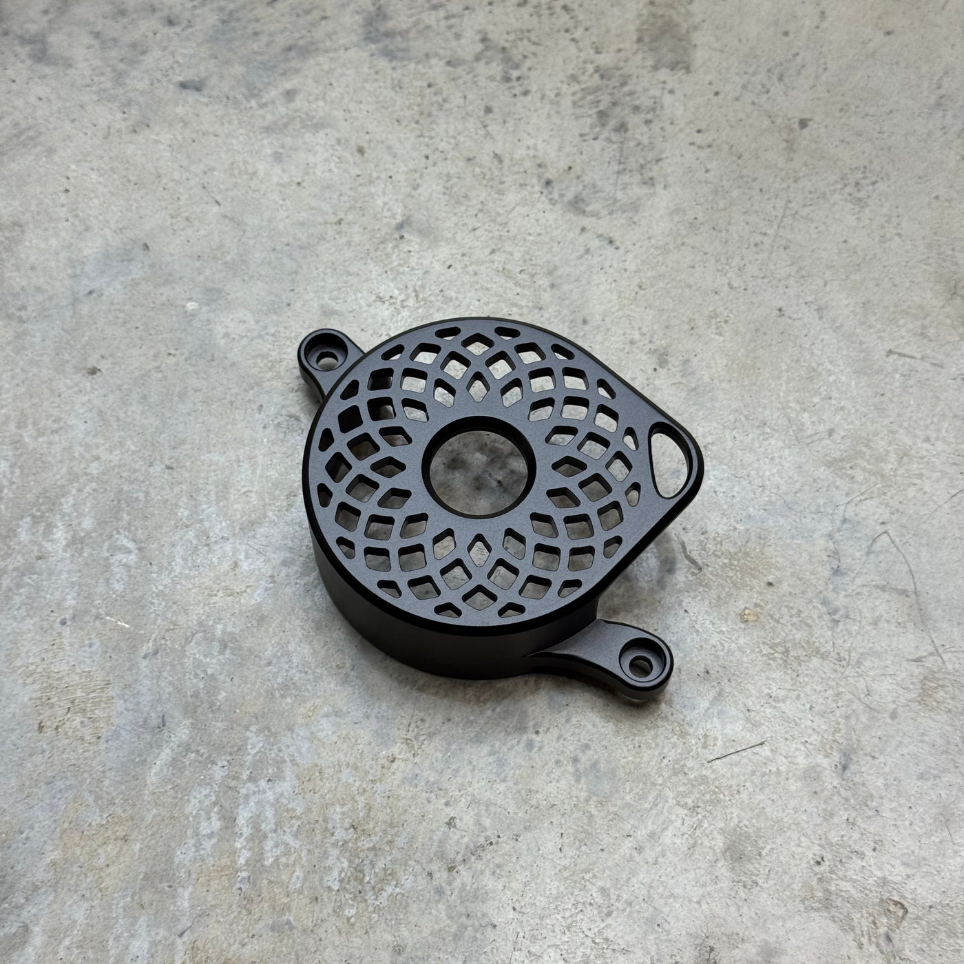 Surron Ultra Bee Aluminum Motor Cover — mounting hardware view