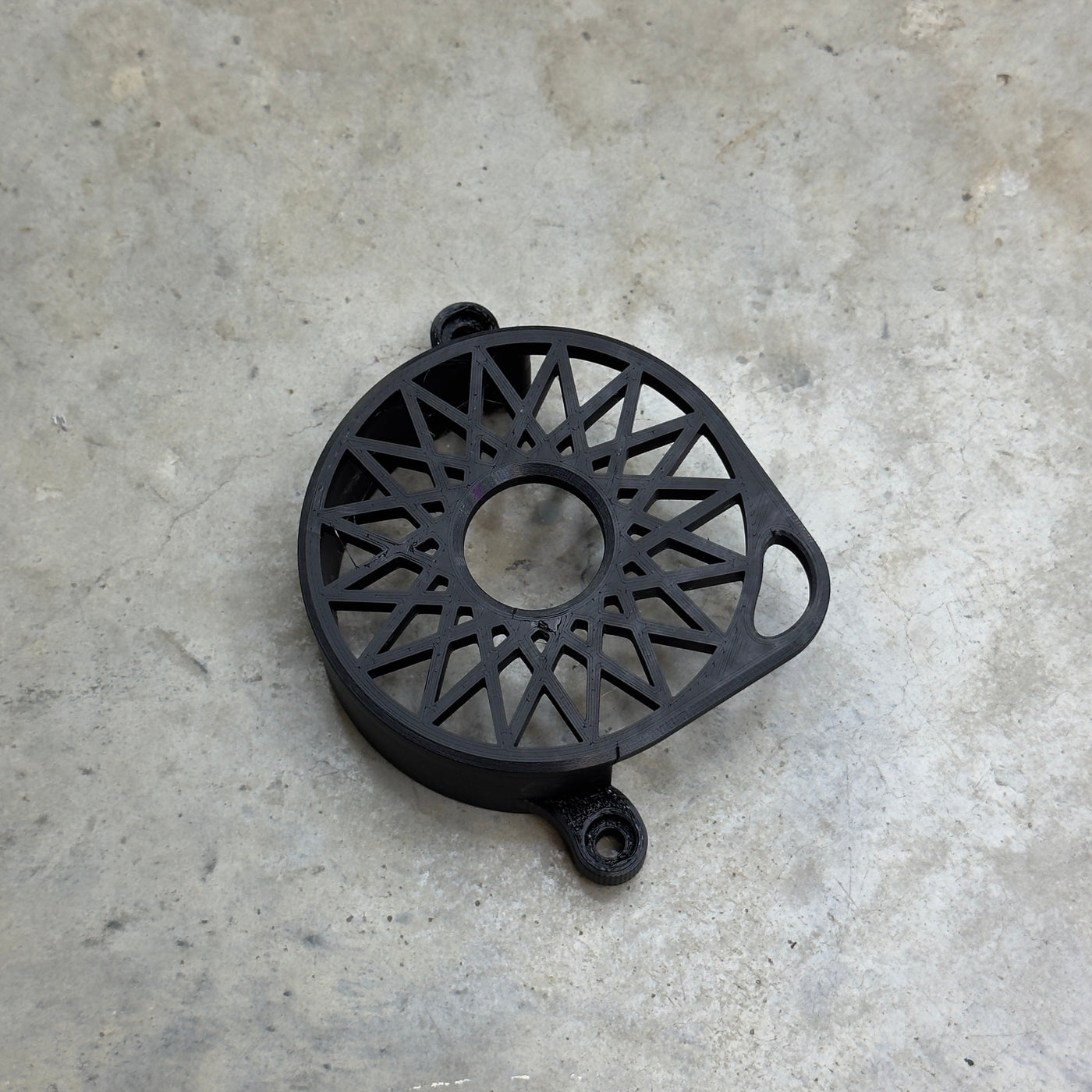 Surron Ultra Bee motor cover front angle – showing mounting boss positions