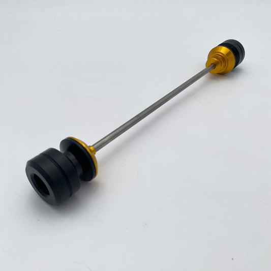 Warp 9 Ultra Bee front supermoto axle slider in gold anodized — CNC machined with captive axle blocks and alignment marks

