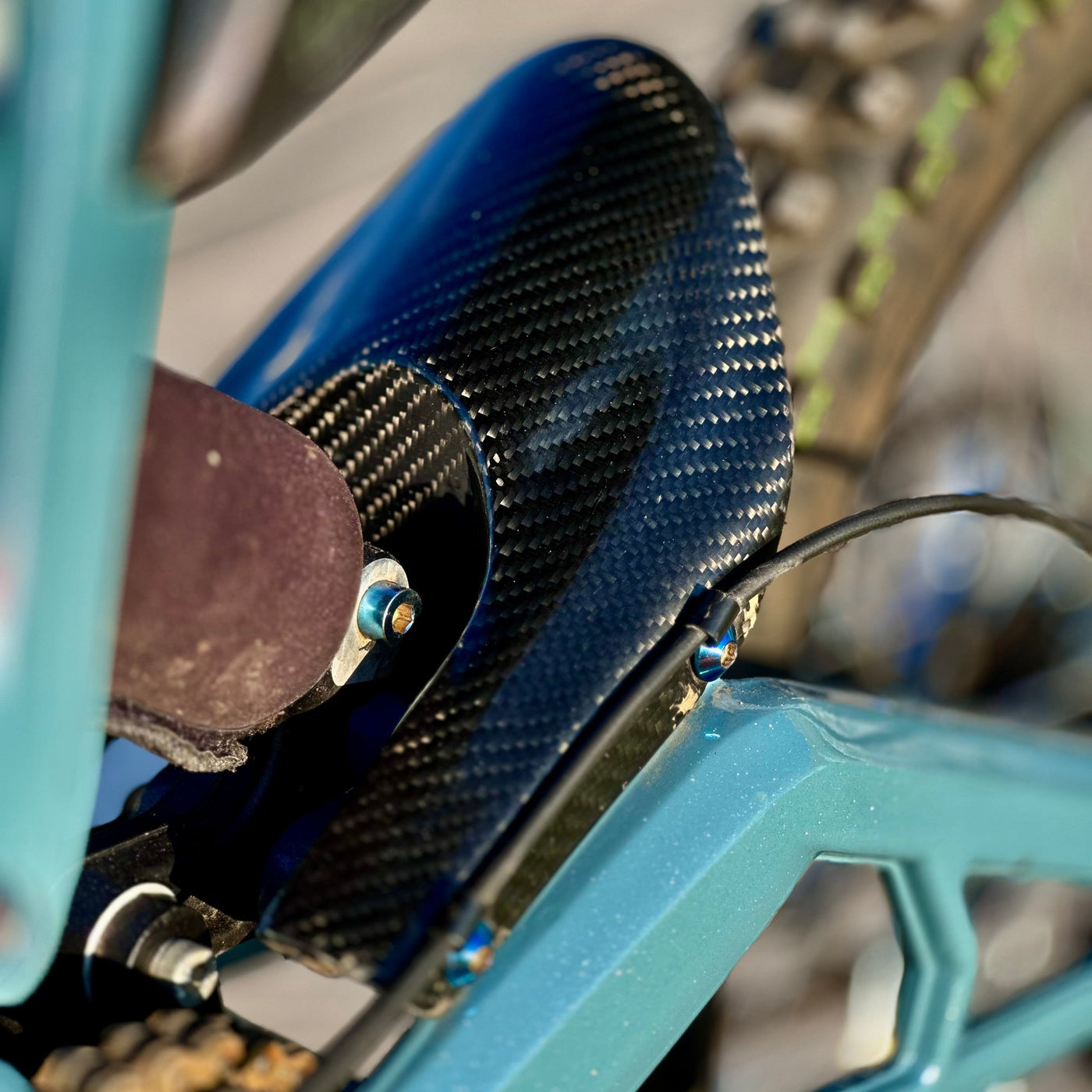 E-Ride Pro Carbon Fiber Mud Guard — carbon weave texture close-up