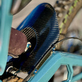 E-Ride Pro Carbon Fiber Mud Guard — carbon weave texture close-up
