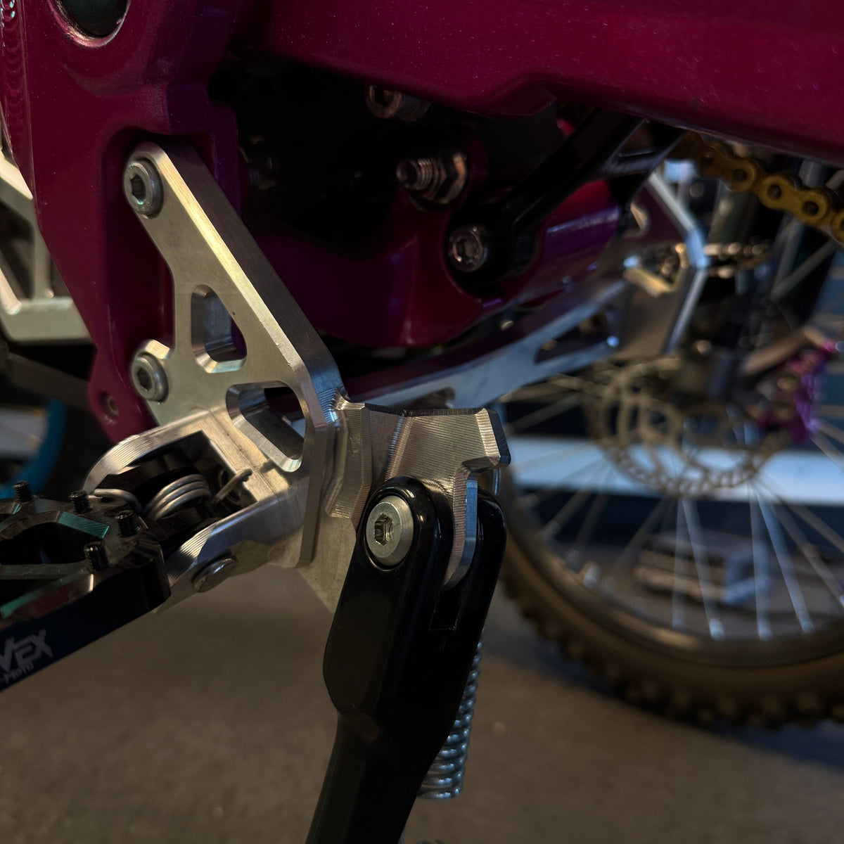 KyVex Billet Peg Bracket & Brace for Talaria MX4 — installed side view
