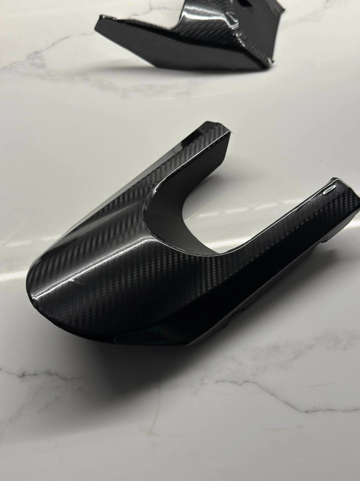 E-Ride Pro carbon fiber wrap kit — battery panel detail