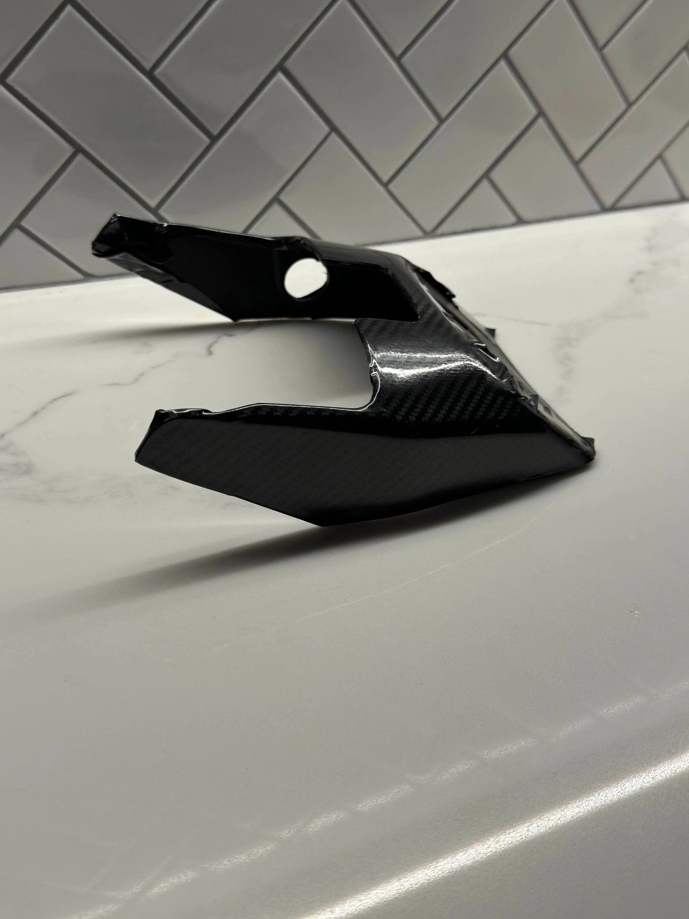E-Ride Pro carbon fiber wrap kit — fender and side panel detail