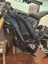 E-Bike invisible Vantablack battery wrap — before and after comparison on battery box