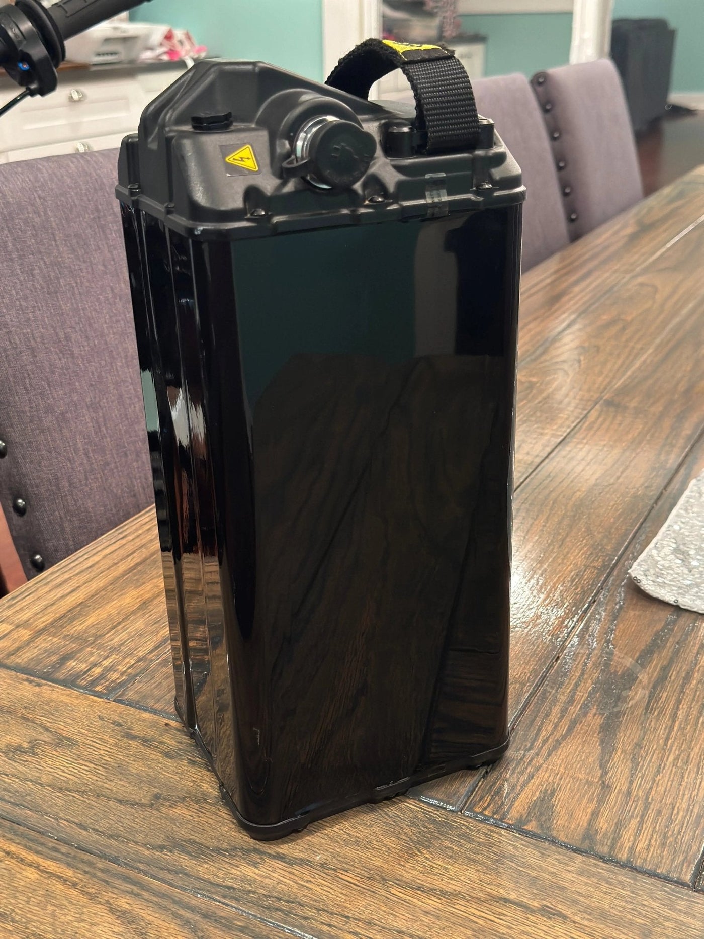 E-Bike invisible Vantablack battery wrap — rider POV showing stealth profile