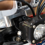 S2 headlight mount for Surron LBX — billet bracket angled view showing hardware detail