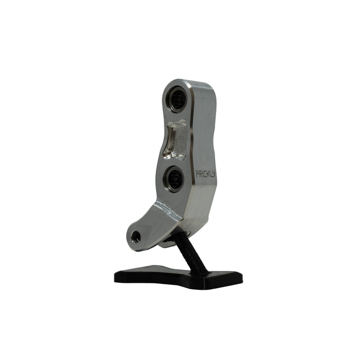 Prickly Performance Linkage Lift for Surron LBX — billet 7075 geometry upgrade kit, raw finish