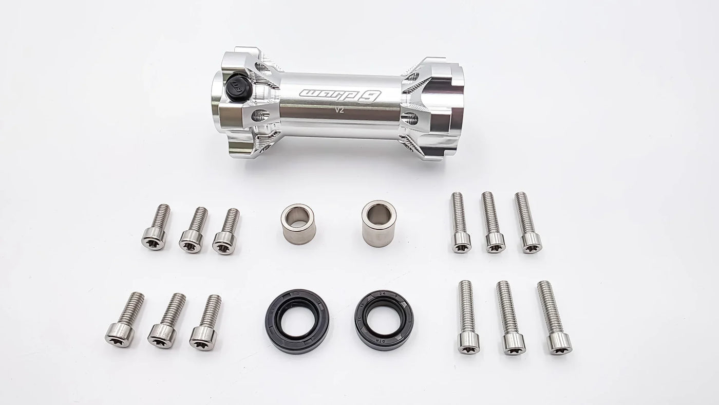 Warp 9 Jackshaft for Surron LBX — component layout showing bearing and shaft assembly