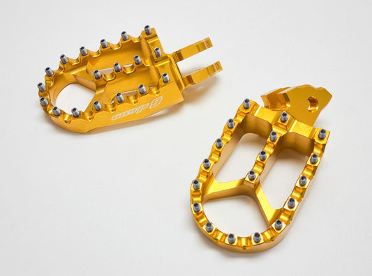 Warp 9 foot pegs for Surron Light Bee X — gold anodized